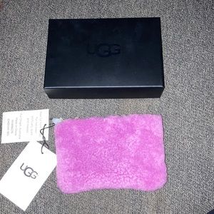 UGG Lilac colored sheep skin zip pouch